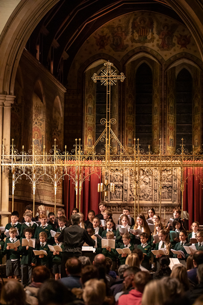 Members of a local school join Promenade to perform at St Peter's Church